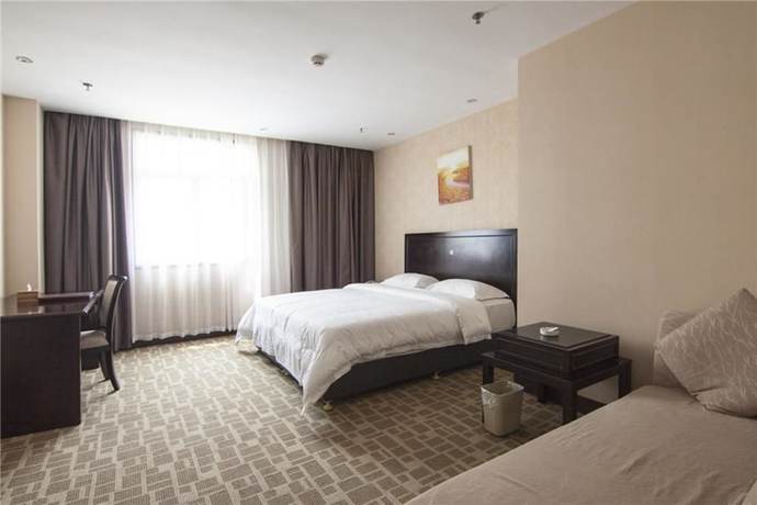 Imagen de la habitación del Hotel Everbright Business Hotel - Xiamen. Foto 19