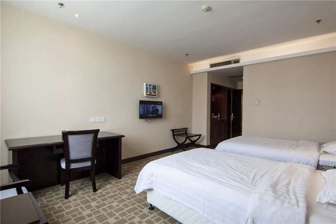 Imagen de la habitación del Hotel Everbright Business Hotel - Xiamen. Foto 20