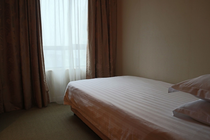 Imagen de la habitación del Hotel Everbright Convention and Exhibition Centre. Foto 10