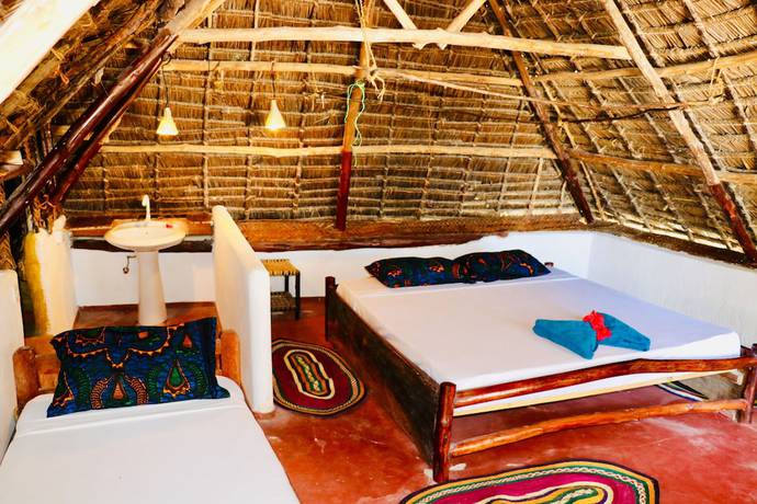 Imagen de la habitación del Hotel Evergreen Bungalows. Foto 11