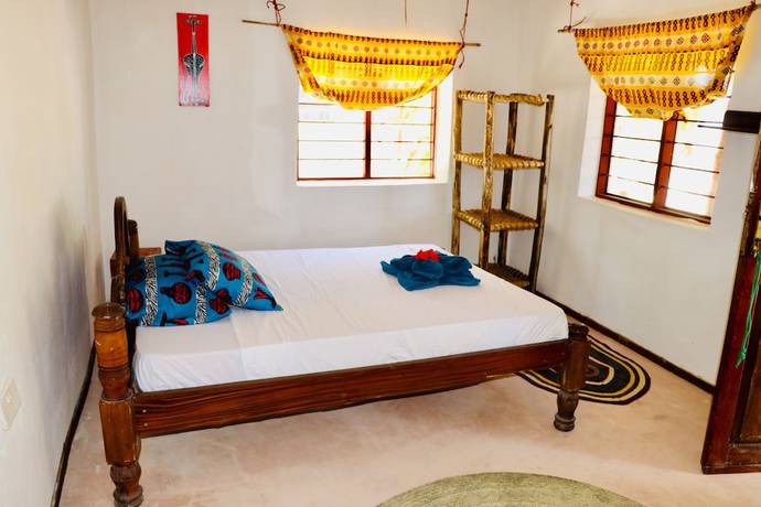 Imagen de la habitación del Hotel Evergreen Bungalows. Foto 15