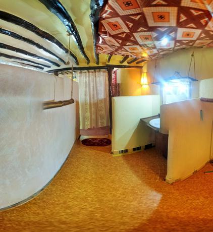 Imagen de la habitación del Hotel Evergreen Bungalows. Foto 17