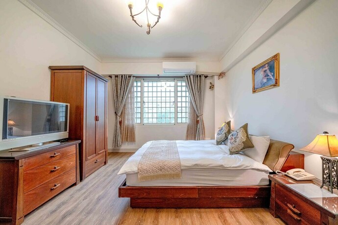 Imagen de la habitación del Hotel Evergreen Garden House. Foto 16