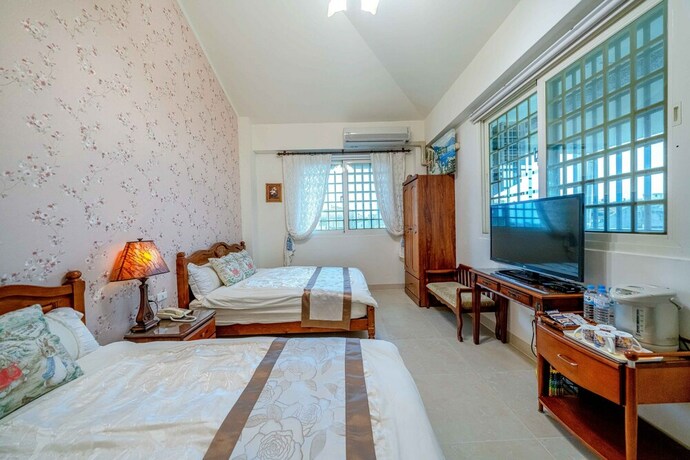 Imagen de la habitación del Hotel Evergreen Garden House. Foto 21