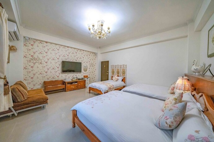 Imagen de la habitación del Hotel Evergreen Garden House. Foto 26