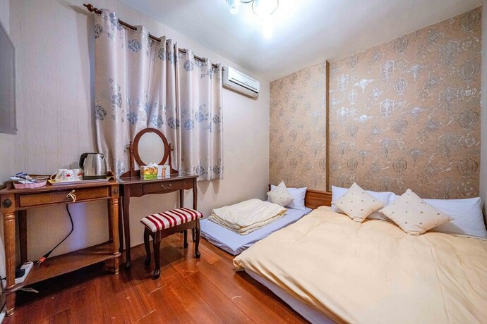 Imagen de la habitación del Hotel Evergreen Garden House. Foto 31