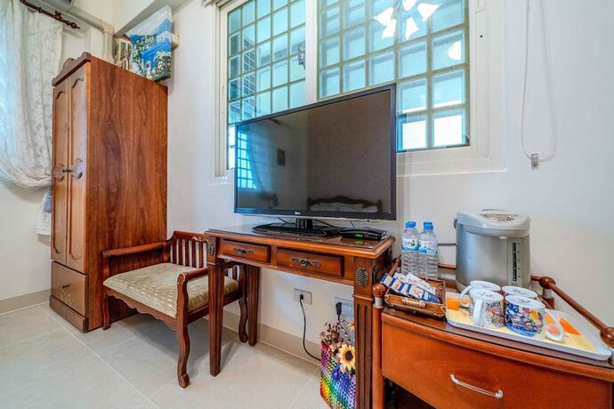 Imagen de la habitación del Hotel Evergreen Garden House. Foto 34