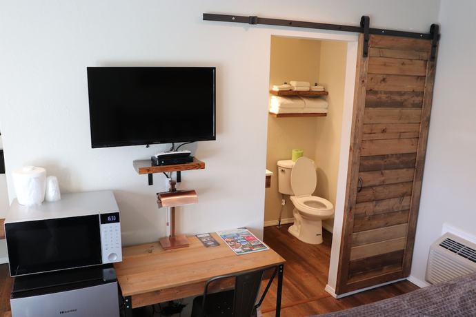 Imagen de la habitación del Hotel Evergreen Motel. Foto 7