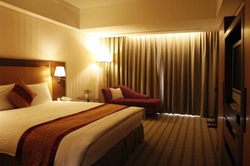 Imagen de la habitación del Hotel Evergreen Plaza Tainan. Foto 10