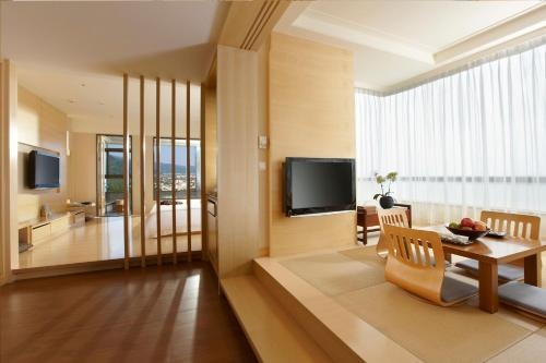 Imagen de la habitación del Hotel Evergreen Resort - Jiaosi. Foto 7