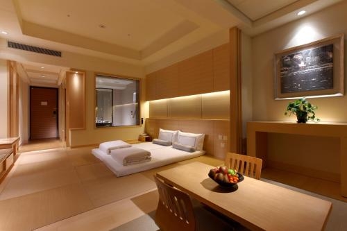 Imagen de la habitación del Hotel Evergreen Resort - Jiaosi. Foto 9