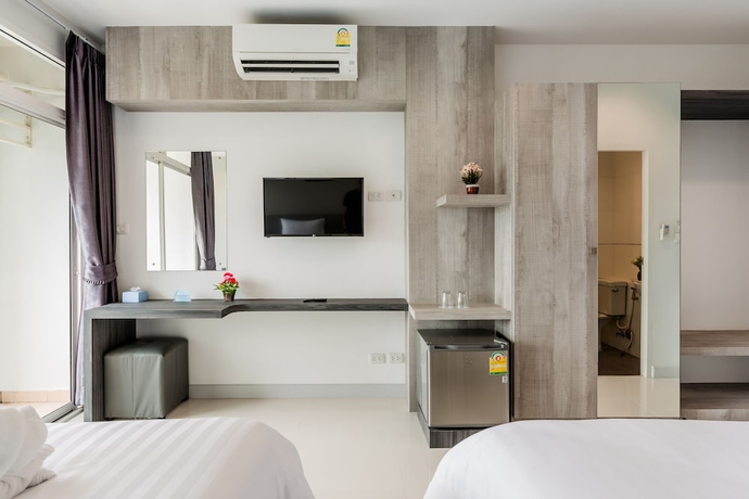 Imagen de la habitación del Hotel Evergreen Suite. Foto 11