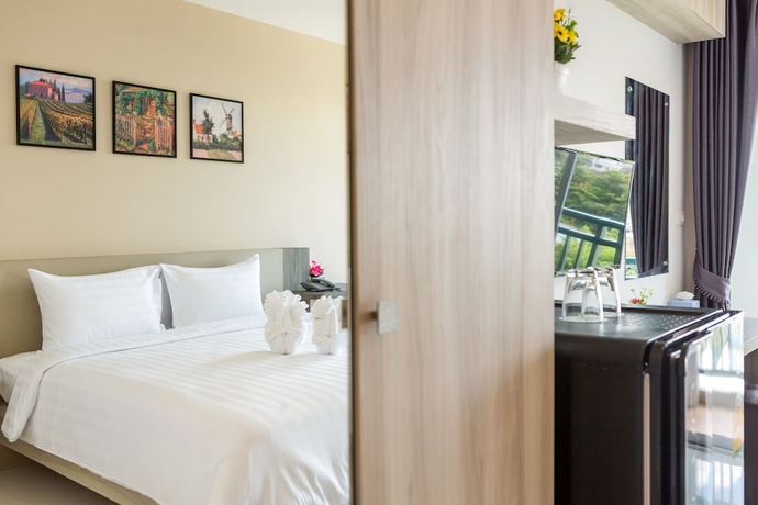 Imagen de la habitación del Hotel Evergreen Suite. Foto 13