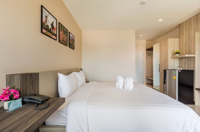 Imagen de la habitación del Hotel Evergreen Suite. Foto 14