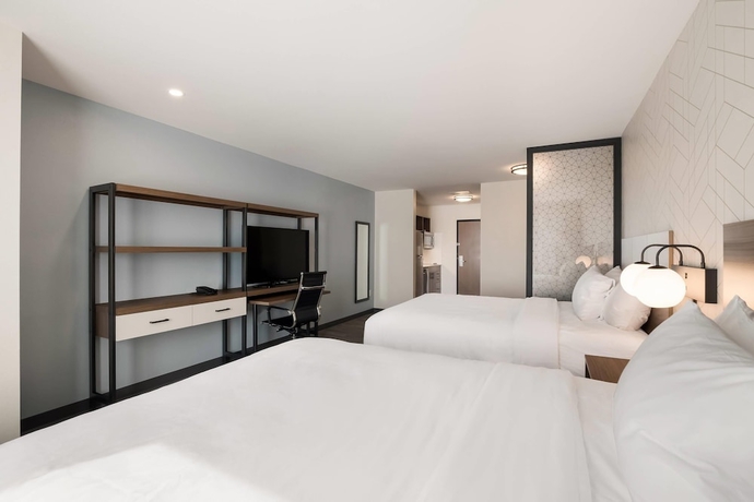 Imagen de la habitación del Hotel Everhome Suites Corona. Foto 2