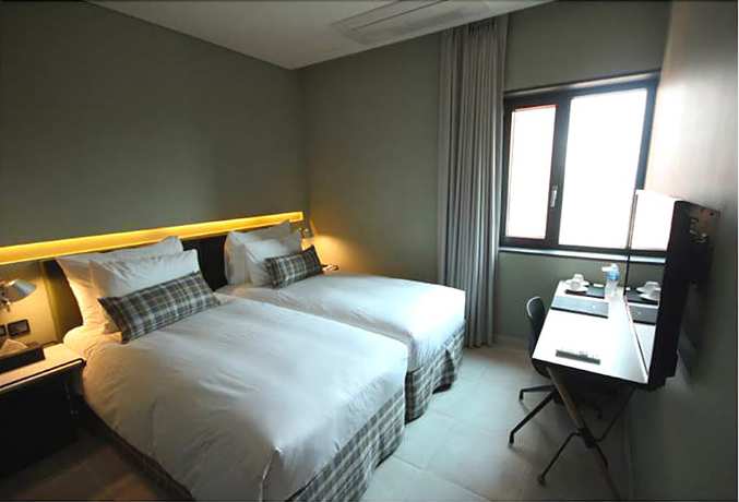 Imagen de la habitación del Hotel Everrich. Foto 16