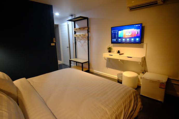 Imagen de la habitación del Hotel Every Surawong. Foto 8