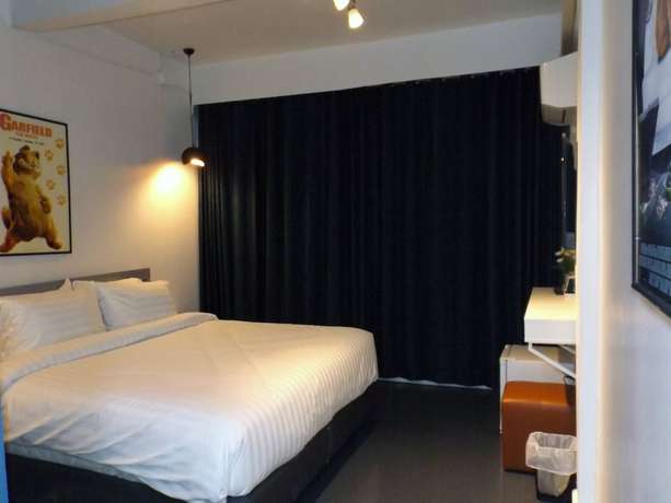 Imagen de la habitación del Hotel Every Surawong. Foto 9