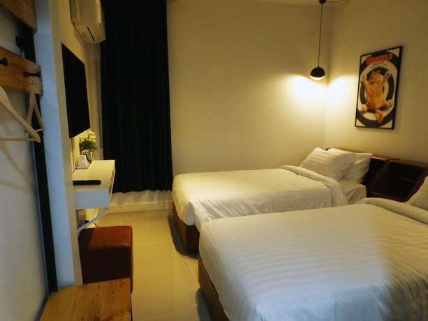 Imagen de la habitación del Hotel Every Surawong. Foto 17