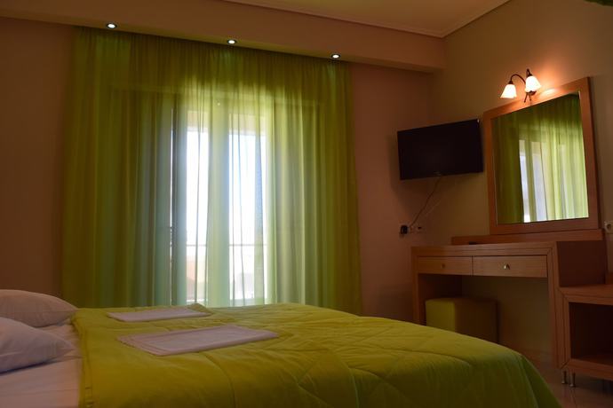 Imagen de la habitación del Hotel Evia And Suites. Foto 6