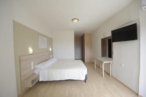 Imagen de la habitación del Hotel Evia Riviera Resort by Anayia. Foto 17