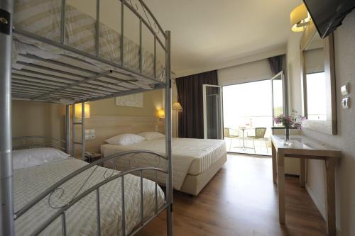 Imagen de la habitación del Hotel Evia Riviera Resort by Anayia. Foto 19