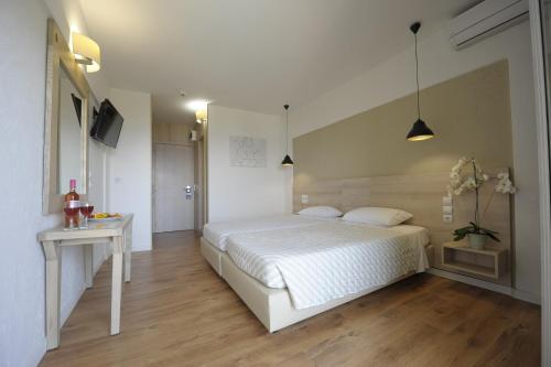Imagen de la habitación del Hotel Evia Riviera Resort by Anayia. Foto 20