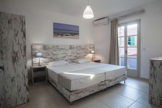 Imagen de la habitación del Hotel Evina Rooms and Suites. Foto 11