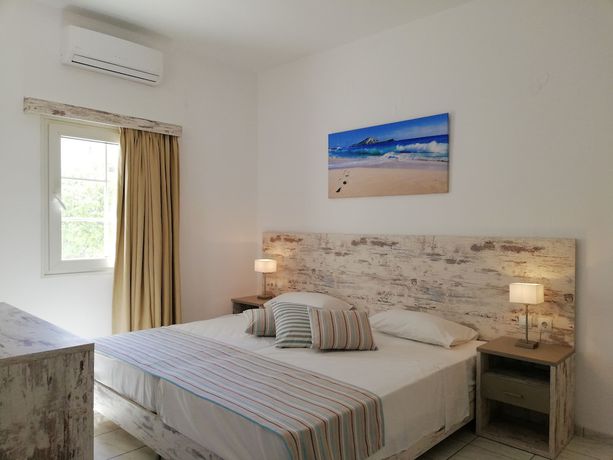Imagen de la habitación del Hotel Evina Rooms and Suites. Foto 13