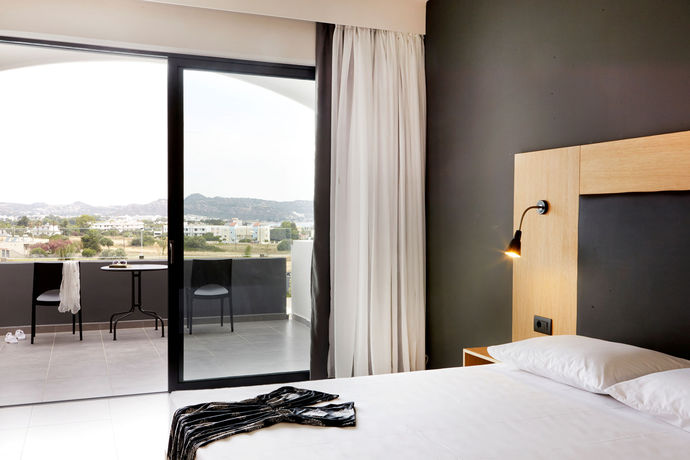 Imagen de la habitación del Hotel Evita Resort. Foto 11