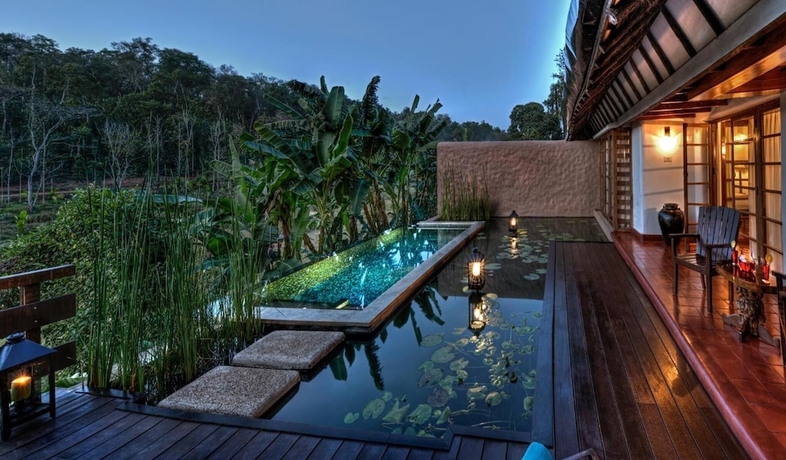 Imagen de la piscina del Hotel Evolve Back, Coorg. Foto 16
