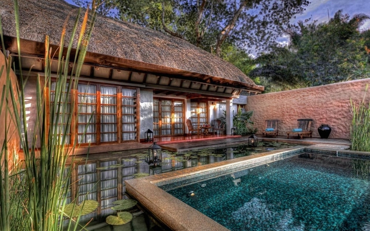 Imagen de la piscina del Hotel Evolve Back, Coorg. Foto 17