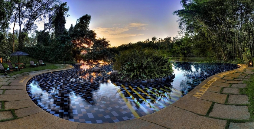 Imagen de la piscina del Hotel Evolve Back, Coorg. Foto 19