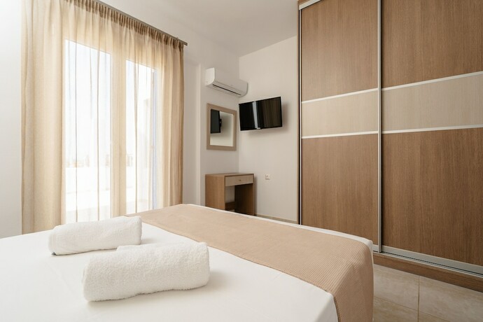 Imagen de la habitación del Hotel Evripus Suites. Foto 16