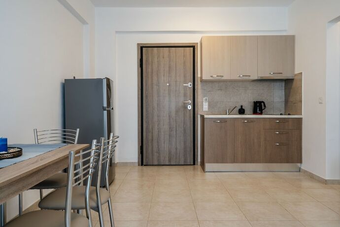 Imagen de la habitación del Hotel Evripus Suites. Foto 19