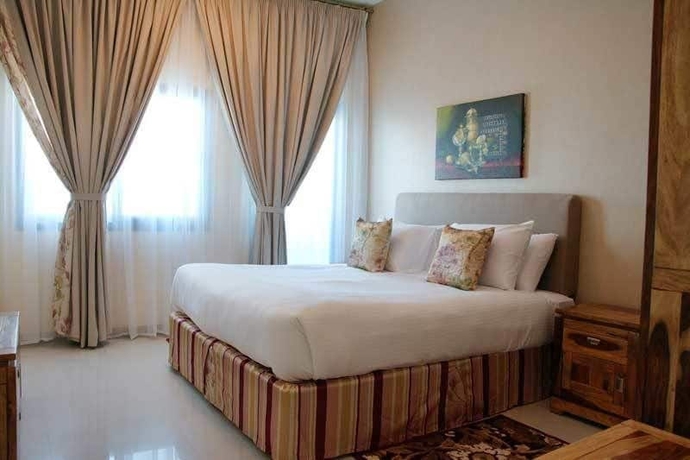 Imagen de la habitación del Hotel Ewan Tower Apartments. Foto 10