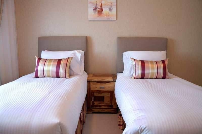 Imagen de la habitación del Hotel Ewan Tower Apartments. Foto 11