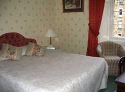 Imagen de la habitación del Hotel Ewington. Foto 4