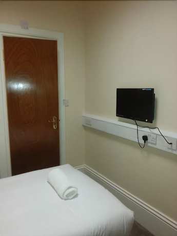 Imagen de la habitación del Hotel Excel Guest House. Foto 11