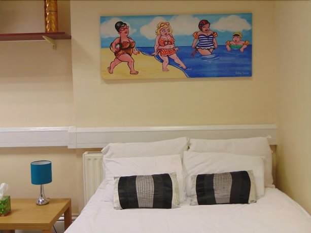 Imagen de la habitación del Hotel Excel Guest House. Foto 12