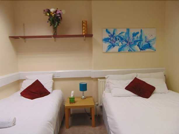 Imagen de la habitación del Hotel Excel Guest House. Foto 13