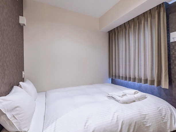 Imagen de la habitación del Hotel Excellence Enmachi Ekimae. Foto 9