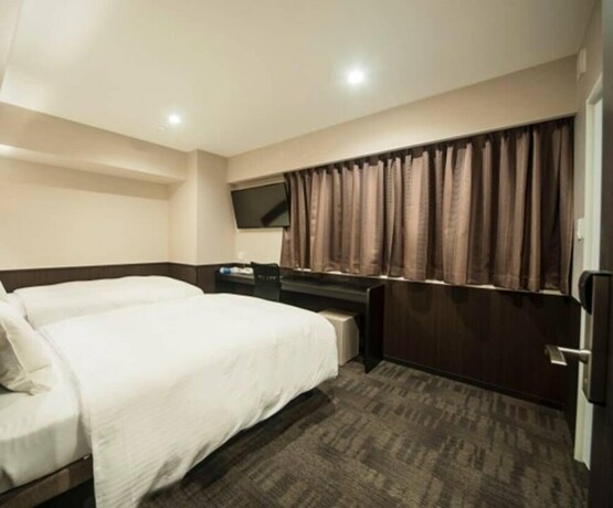 Imagen de la habitación del Hotel Excellence Kyoto Station Nishi. Foto 6