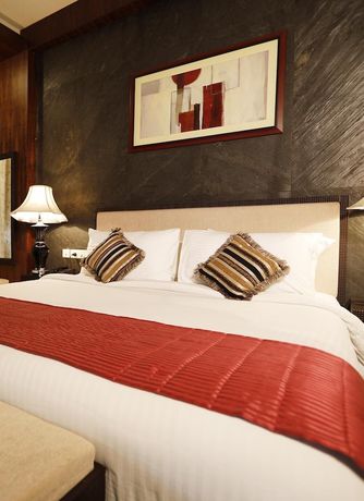 Imagen de la habitación del Hotel Excellency, Bhubaneswar. Foto 5