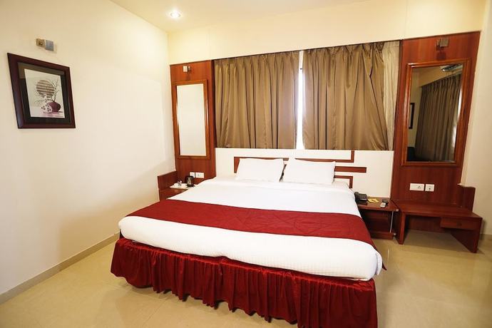Imagen de la habitación del Hotel Excellency, Bhubaneswar. Foto 6