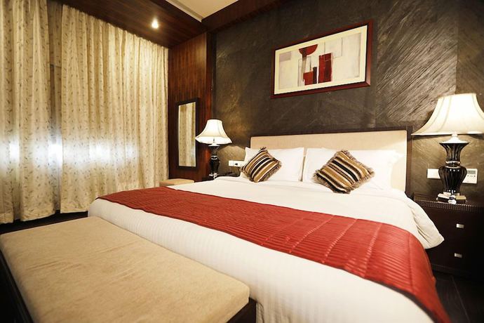 Imagen de la habitación del Hotel Excellency, Bhubaneswar. Foto 7