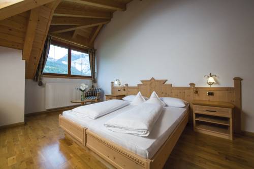 Imagen de la habitación del Hotel Excelsior Dolomites Life Resort. Foto 6