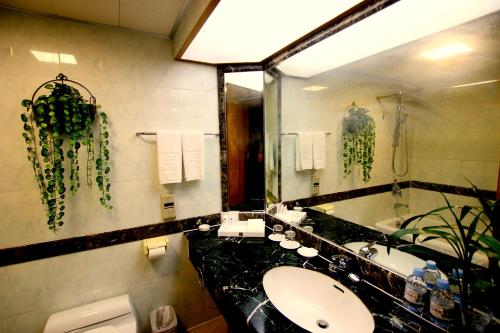 Imagen de la habitación del Hotel Excemon Beach Beihai. Foto 7