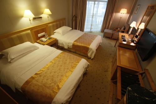 Imagen de la habitación del Hotel Excemon Beach Beihai. Foto 9