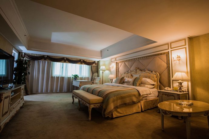 Imagen de la habitación del Hotel Excemon Xinjiang Yilite. Foto 2